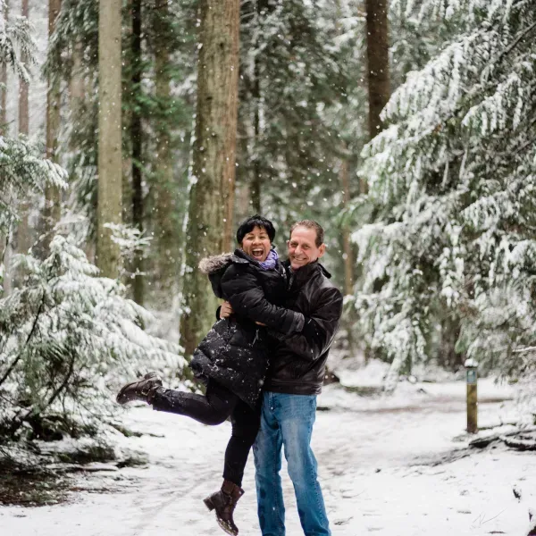 couple hugging in snow